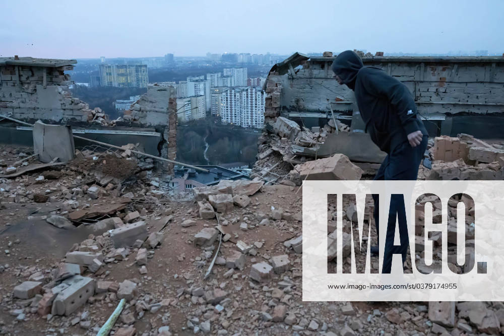 Russian drone attack on residential building in Kyiv, Ukraine - 22 Dec 2023 A man stands at the site of a drone attack on a residential building in Kyiv. At least two people were injured after a Russian drone attack hit a residential building in Kyiv, for the third time.Russia s Shahed type drone hit a residential building in the Ukrainian capital. Kyiv Ukraine