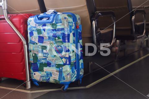 Passenger suitcases containing stickers are placed in the train cabin. Traveler who likes collecting stickers while traveling. Yogyakarta - Indonesia, 09 03 2023; tourism sticker object stickeres indoors ancient memo grunge symbol backgrounds airplane label car trunk hippie nostalgia stick stickers travelling aboard country travel shirt clothes retro leisure camera vacation tourist holiday concept baggage full clothing vintage background adventure voyage handle journey suitcase case luggage trip bag fashion accessory lifestyle business elegant human