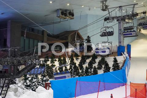 Dudai, UAE - March,20,2023: Attraction in the Mall of the Emirates Ski Dubai in Dubai, UAE, ski dubai sport mall of the emirates ski dubai uae winter slope cold united snow people vacation inside city styles luxury urban mall destinations area united arab emirates emirates tourism arab ski lift snow sports snow resort winter activities healthy skiing people skiing unique building travelling landmark dubai vacation attractions