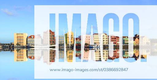 A beautiful shot of colorful building in the city with reflection on water 1955932