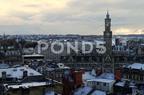Bradford, UK 11 30 2023 - Winter skyline of the centre of Bradford, with the city hall clock tower dominating the view. Bradford is preparing for city of culture in 2025 architecture bd25 bradford buildings built centre city city hall city of culture cityscape clock tower culture england frosty gothic industrial panorama roofs city sky skyline tourism tower town town hall urban victorian view west yorkshire yorkshire