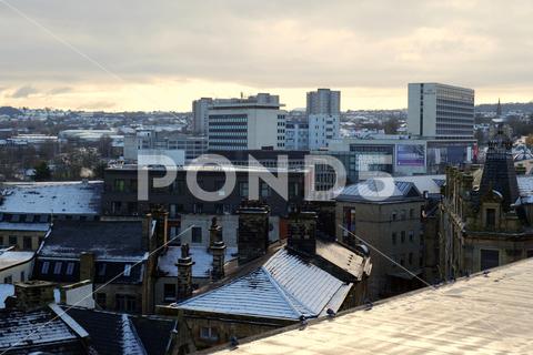 Bradford, UK 11 30 2023 - Winter skyline of the centre of Bradford, with the Science and Media Museum in the centre. Bradford is preparing for city of culture in 2025 architecture bd25 bradford buildings built centre city ice skating city of culture cityscape culture england frosty gothic industrial panorama roofs city sky skyline tourism tower town town hall urban victorian view west yorkshire yorkshire museum