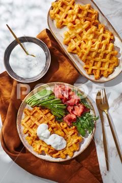 Hearty sweet potato or pumpkin waffles with avocado, salmon, arugula and sauce waffle salmon sweet potato pumpkin breakfast avocado healthy food delicious meal dinner lunch tasty fish morning dish snack homemade diet plate fresh green vegetable brunch cooking background gourmet salad smoked baked epicure bread toast sauce belgian healthy breakfast wafer fat eating organic fast food nourishment smoked salmon herb belgian waffles ketogenic arugula