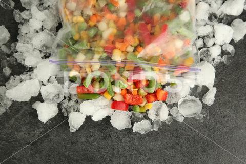 Zip bag with different frozen vegetables and ice on grey table, top view asparagus assortment background bag carrot cold cooking corn cut delicious diet different eating flat food freeze freezer freezing fresh frost frozen grey healthy homemade ice ingredient kitchen lay mix mixed natural nutrition object organic peas pepper product raw space storage table tasty top various vegan vegetables vegetarian view vitamin zip