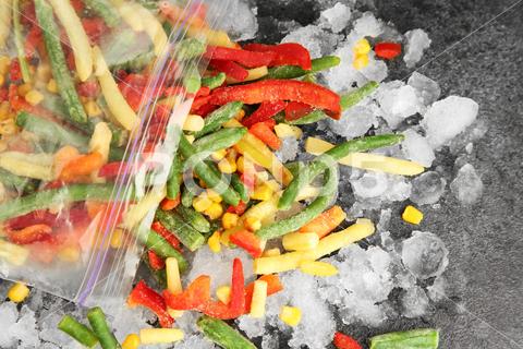 Zip bag with different frozen vegetables and ice on grey table, top view asparagus assortment background bag carrot cold cooking corn cut delicious diet different eating flat food freeze freezer freezing fresh frost frozen grey health healthy homemade ice ingredient kitchen lay meal mix mixed natural nutrition object organic pepper product raw storage table tasty top various vegan vegetables vegetarian view vitamin zip