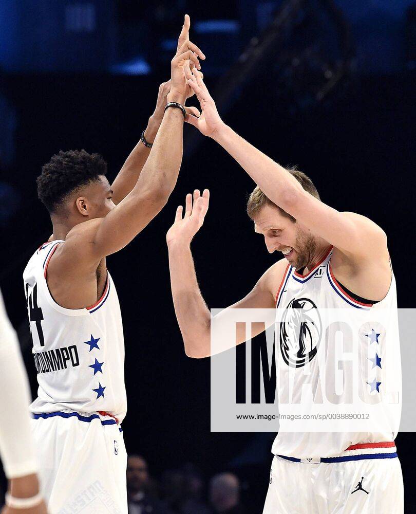 Charlotte, NC, USA - Dallas Mavericks Dirk Nowitzki, right, is all smiles as he is congratulated by teammate Milwaukee Bucks Giannis Antetokounmpo, left, after hitting two three-point baskets during the NBA Basketball Herren USA All-Star Game at Spectrum Center in Charlotte, N.C. on Sunday, February 17, 2019. 2019 NBA All-Star Game - ZUMAm67_ 20190217_zaf_m67_112