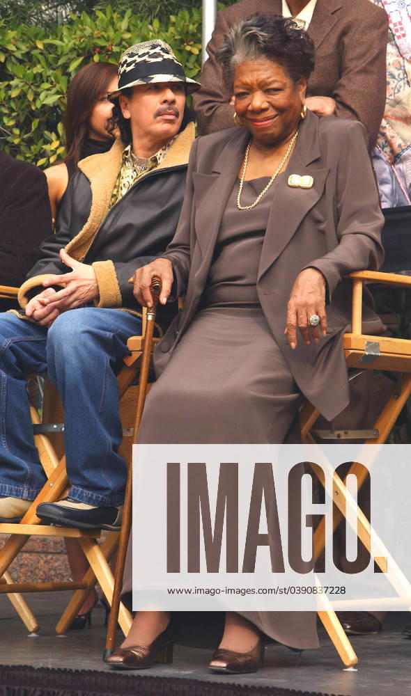 IMAGO ICONS: Maya Angelou Finding our Families, Finding Ourselves Exhibition Opening Carlos Santana and Dr. Maya Angelou at the Opening Day of Finding Our Families, Finding Ourselves Exhibit held at The Museum of Tolerance in Los Angeles, California on February 10,2003 Photo by Debbie VanStory iPhoto.ca - DVSLAF02100307 LA California United States