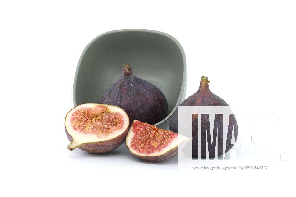 Ripe fig fruits isolated on white background Ripe fresh fig fruits isolated on white background, full depth of field