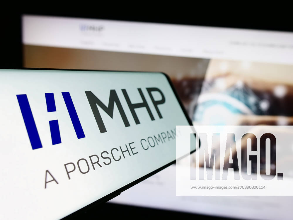 Smartphone with logo of company MHP Management- und IT-Beratung GmbH on screen in front of website. Stuttgart, Germany - 08-20-2023: Smartphone with logo of company MHP Management- und IT-Beratung GmbH on screen in front of website. Focus on center-left of phone display.