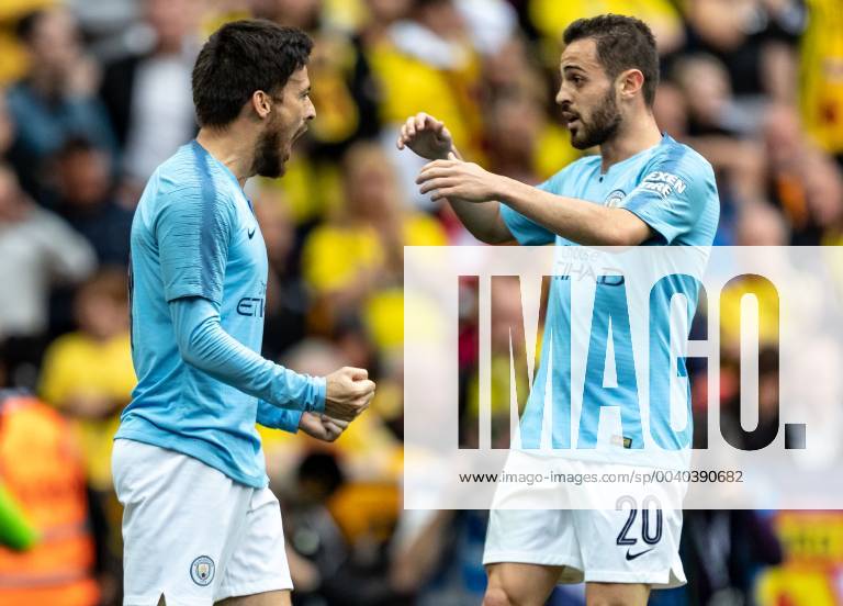 David Silva of Manchester City celebrates scoring the 1st goal with Bernardo Silva of Manchester City during the FA CUP FINAL match between Manchester City and Watford at Wembley Stadium, London, England on 18 May 2019.