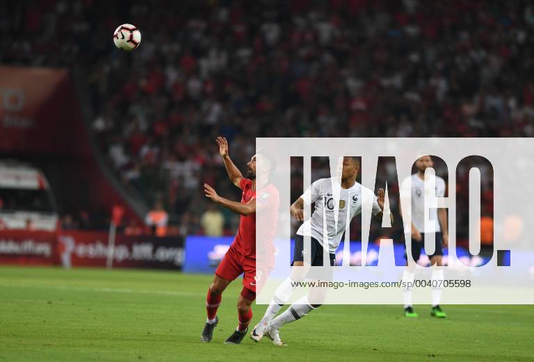 Turkeys Hasan Ali Kaldirim and Frances Kylian Mbappe during Euro 2020 group H qualifying soccer match between Turkey and France at the Konya City Stadium in Konya, Turkey