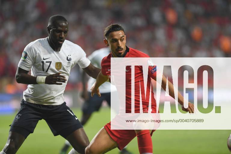 Turkeys Irfan Can Kahveci and Frances Moussa Sissoko during Euro 2020 group H qualifying soccer match between Turkey and France at the Konya City Stadium in Konya, Turkey