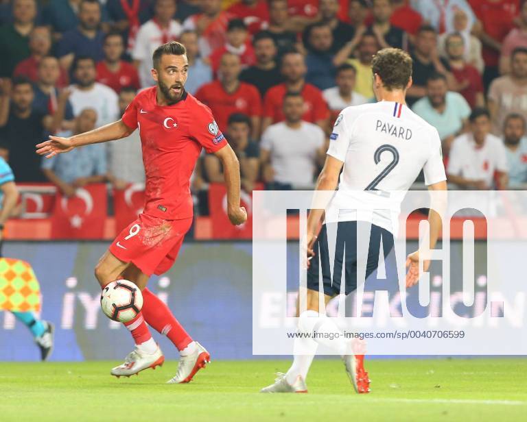 Kenan Karaman (L) of Turkey and Benjamin Pavard (R) of France during the Euro 2020 football qualification match between Turkey and France at the Buyuksehir Belediyesi stadium in Konya, on June 8, 2019.