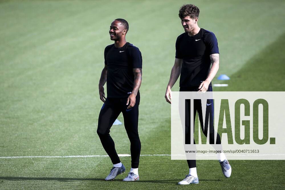 Guimaraes, Portugal - Raheem Sterling of England and Manchester City FC and John Stones of England and Manchester City FC during the training session at Complexo Vitoria Clube in Guimaraes, Portugal, 8 June 2019 ahead of the UEFA Nations League 3rd place football match Switzerland vs England. England Training Session - UEFA Nations League Final - ZUMAn230 20190608_zaa_n230_601