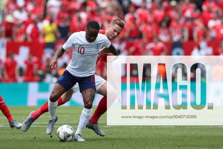 Guimaraes, Portugal - Raheem Sterling of England (L) vies with Switzerland s defender Nico Elvedi (R ) during the UEFA Nations League Third-place football match between Switzerland and England, at the Dom Afonso Henriques stadium in Guimaraes, Portugal, on June 9, 2019. Switzerland vs England - UEFA Nations League Third-place match - ZUMAn230 20190609_zaa_n230_067