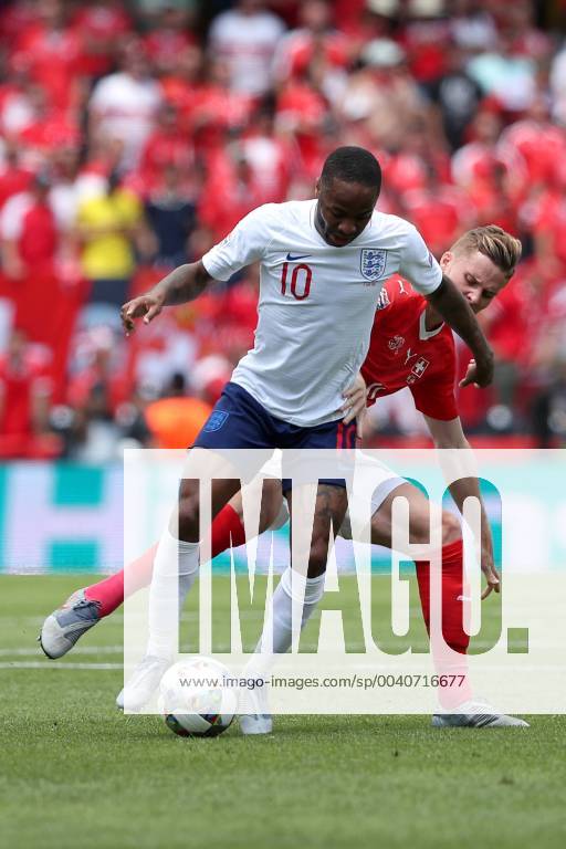 Guimaraes, Portugal - Raheem Sterling of England (L) vies with Switzerland s defender Nico Elvedi (R ) during the UEFA Nations League Third-place football match between Switzerland and England, at the Dom Afonso Henriques stadium in Guimaraes, Portugal, on June 9, 2019. Switzerland vs England - UEFA Nations League Third-place match - ZUMAf123 20190609_zap_f123_002