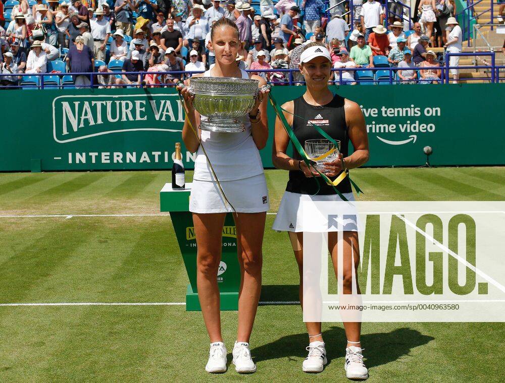 KW26 29th June 2019, Devonshire Park, Eastbourne, England; Nature Valley International Tennis Tournament; Karolina Pliskova (CZE) with her winners trophy after winning the womens singles final with runner up Angelique Kerber (GER) ActionPlus12148923 HongboxChen