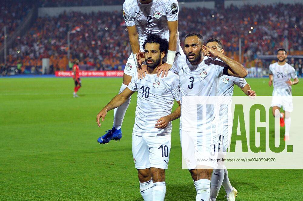 Mohamed salah and his team-mate celebrate the goal he scored on a majestic free-kick during the Match Egypt vs Uganda Group A Total Africa Cup of Nations Egypt 2019 at Cairo International Stadium.photo: Chokri Mahjoub Total Africa Cup of Nations Egypt 2019: Egypt vs Uganda