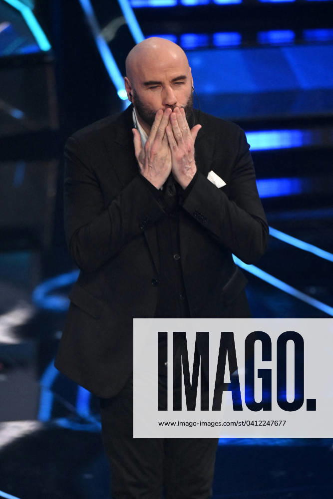 Sanremo, 74th Italian Song Festival. - Second evening, John Travolta dances with Amadeus and Fiorello Sanremo, 74th Italian Song Festival - Second Evening - in the photo: John Travolta Sanremo Italy