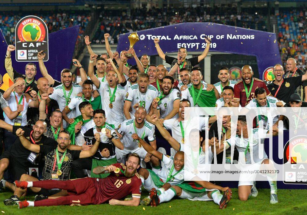(190720) -- CAIRO, July 20, 2019 -- Team Algeria celebrate during the awarding ceremony after winning the 2019 Africa Cup of Nations final match between Senegal and Algeria in Cairo, Egypt on July 19, 2019. Algeria won 1-0 and claimed the title. ) (SP)EGYPT-CAIRO-SOCCER-AFRICA CUP OF NATIONS-FINAL-SENEGAL VS ALGERIA LixYan
