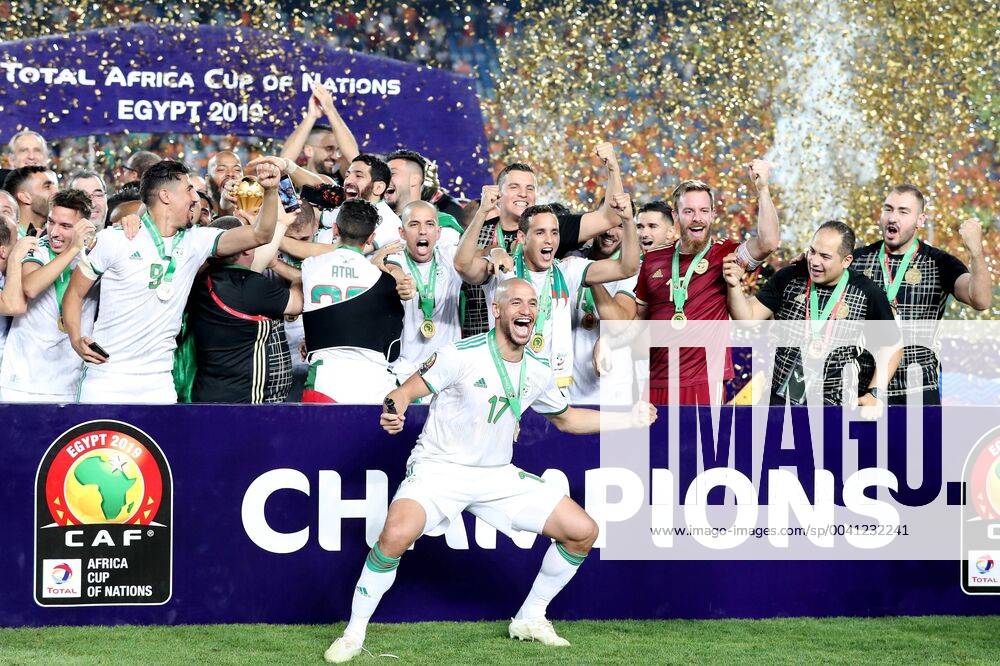 (190720) -- CAIRO, July 20, 2019 -- Team Algeria celebrate during the awarding ceremony after the 2019 Africa Cup of Nations final match between Senegal and Algeria in Cairo, Egypt on July 19, 2019. Algeria won 1-0 and claimed the title. ) (SP)EGYPT-CAIRO-SOCCER-AFRICA CUP OF NATIONS-FINAL-SENEGAL VS ALGERIA WangxTeng