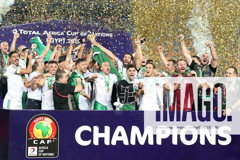 (190720) -- CAIRO, July 20, 2019 -- Team Algeria celebrate during the awarding ceremony after the 2019 Africa Cup of Nations final match between Senegal and Algeria in Cairo, Egypt on July 19, 2019. Algeria won 1-0 and claimed the title. ) (SP)EGYPT-CAIRO-SOCCER-AFRICA CUP OF NATIONS-FINAL-SENEGAL VS ALGERIA WangxTeng
