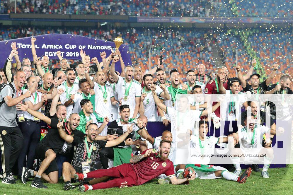 (190720) -- CAIRO, July 20, 2019 -- Team Algeria celebrate during the awarding ceremony after the 2019 Africa Cup of Nations final match between Senegal and Algeria in Cairo, Egypt on July 19, 2019. Algeria won 1-0 and claimed the title. ) (SP)EGYPT-CAIRO-SOCCER-AFRICA CUP OF NATIONS-FINAL-SENEGAL VS ALGERIA WangxTeng