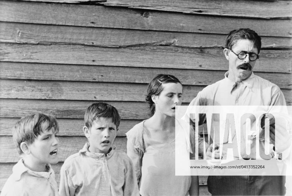 Sunday singing, 1936 (b w photo) 3666411 Sunday singing, 1936 (b w photo) by Evans, Walker (1903-75); Private Collection; (add.info.: Frank Tengle, an Alabama sharecropper, and family singing hymns near Moundville, Hale County. Photograph taken for the U.S. Resettlement Administration: a New Deal U.S. federal agency that, between April 1935 and December 1936, relocated struggling urban and rural families to communities planned by the federal government. ).