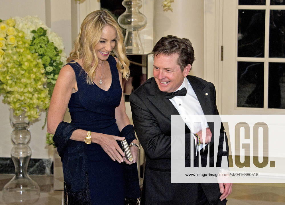 Actor Michael J. Fox, right, and Tracy Pollan, left, arrive for the State Dinner in honor of Prime Minister Trudeau and Mrs. Sophie GrÃgoire Trudeau of Canada at the White House in Washington, DC on Thursday, March 10, 2016. Credit: Ron Sachs Pool via CNP