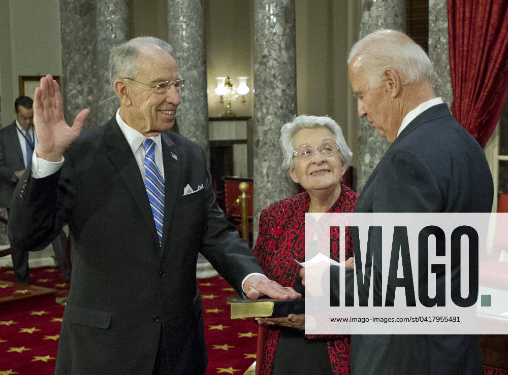 United States Vice President Joe Biden, right, administers the oath of office during a mock swearing-in ceremony to US Senator Chuck Grassley (Republican of Iowa), left, in the Old US Senate Chamber in the US Capitol in Washington, DC on Tuesday, January 3, 2017. Grassley s wife, Barbara holds the Bible at center. Credit: Ron Sachs CNP (RESTRICTION: NO New York or New Jersey Newspapers or newspapers within a 75 mile radius of New York City)