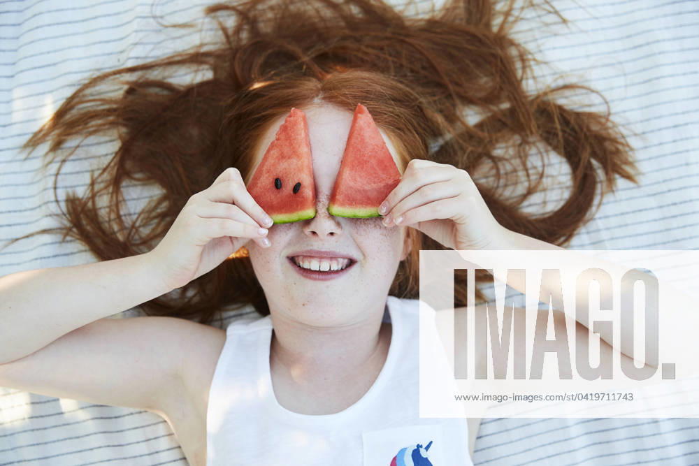Girl and slices of water melon , model released