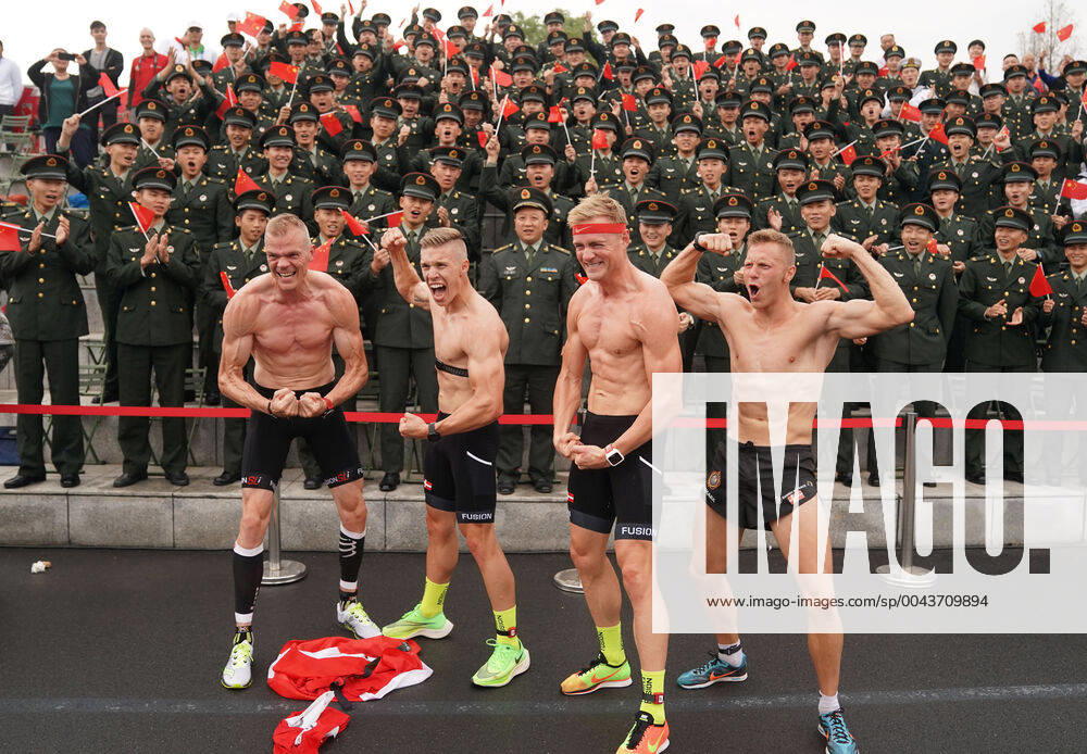 KW43 (191023) -- WUHAN, Oct. 23, 2019 -- Athletes of Denmark pose for photo with soldiers on the stands after the cross country of men s individual of military pentathlon at the 7th CISM Military World Games in Wuhan, capital of central China s Hubei Province, Oct. 23, 2019. ) (SP)CHINA-WUHAN-7TH MILITARY WORLD GAMES-MILITARY PENTATHLON HexChangshan