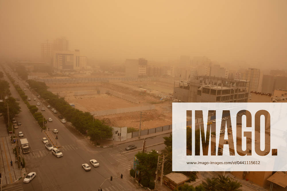 A City Under Dust Clouds 05 06 2020 Ahvaz, Iran. A view of streets and buildings blanketed in a thick haze, in Ahvaz, Khuzestan Province, Iran. Ahvaz has been consistently ranked as one of the world s worst cities for air pollution according to the World Health Organization, topping the list on numerous occasions in the last decade. Air quality is often many times worse than safety limits set by international organizations. Industrial sources, chief among them the refineries and other components of the vast petrochemical industry in Khuzestan Province, as well as massive dust storms, are the main contributors to air pollution. The poor air quality has a significant impact on the lives of the residents of Ahvaz. Each year, thousands seek m
