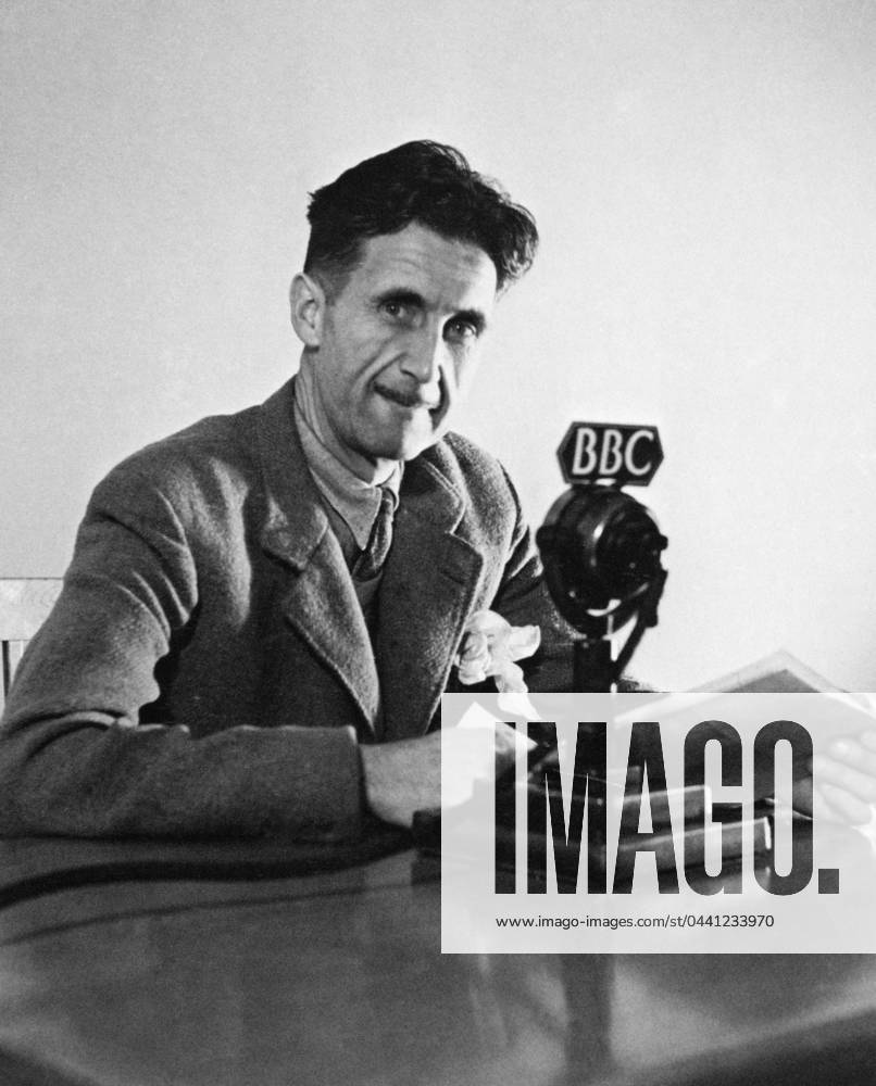 GEORGE ORWELL (1903-1950). Pseudonym of Eric Blair. English novelist and essayist. Orwell broadcasting over the BBC in London in 1943.