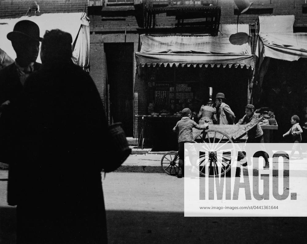 RIIS: PUSHCART, c1910. A vendor s pushcart on a street in New York City. Photograph by Jacob Riis, 1910.