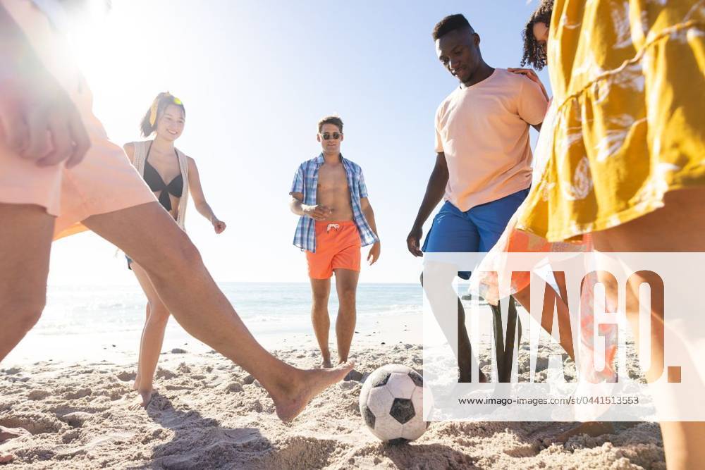 Diverse friends enjoy a game of soccer on the beach Diverse friends enjoy a game of soccer on the beach. The outdoor setting captures the essence of summer fun and teamwork., model released, , property released, Cape Town, South Africa, 2024-01-23T22:00:00.000Z, 5113114.jpg, people,diverse,friends,game,soccer,beach,outdoor,setting,captures,essence,summer,fun,teamwork,sports,activity,leisure,recreation,diverse group,beach game,sunny,enjoying,competition,playing,outdoors,bonding,diversity,beach soccer,beach fun,sunny day,sports activity,outdoor recreation,leisure time,teamwork game,diverse group activity Young Adult,Man,Male,Black,Woman,Female,Multiracial,White