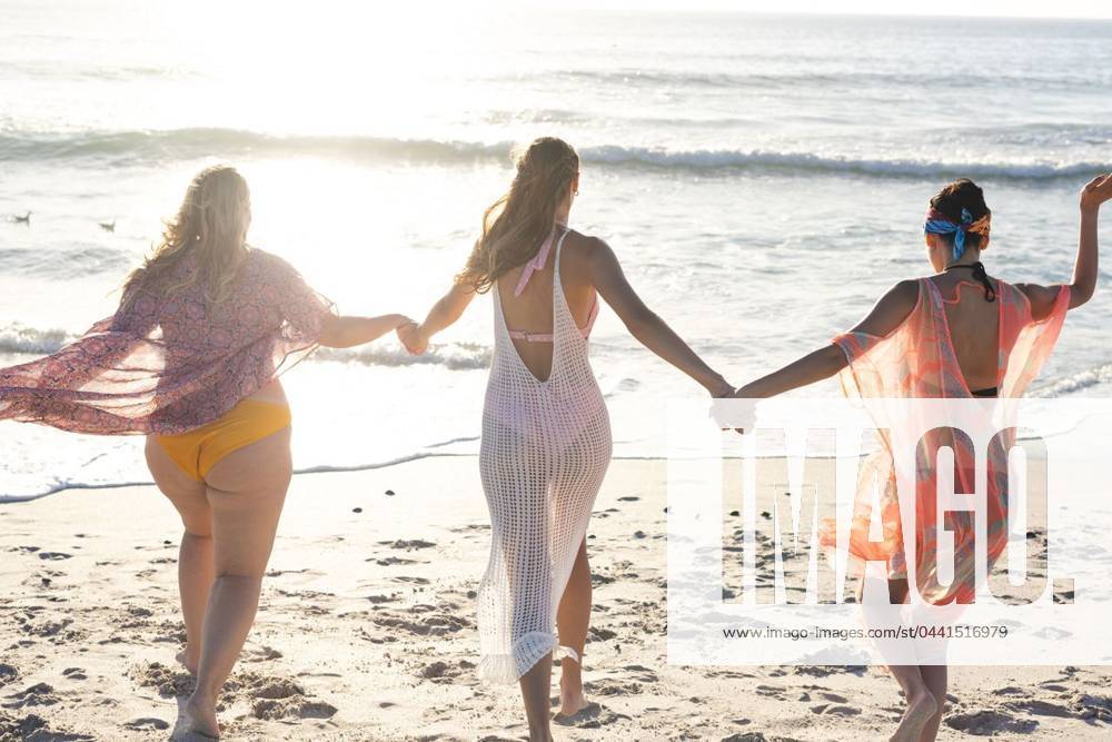 Three women enjoy a beach day together Three women enjoy a beach day together. The group includes two young Caucasian women and a young biracial woman., model released, , property released, Cape Town, South Africa, 2024-01-23T22:00:00.000Z, 5113189.jpg, people,beach,women,group,young,Caucasian,biracial,diversity,friends,fun,leisure,summer,vacation,holiday,sea,ocean,sunny,sand,coastline,bonding,laughter,happiness,cheerful,joy,female,relaxing,sunbathing,recreational,activity,travel,friendship,outdoors,lifestyle,happy,girls,diverse,multiracial,smiling,beach day Young Adult,Woman,Female,Multiracial,White