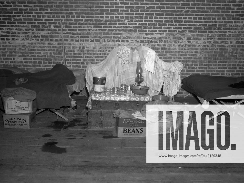 ARKANSAS: REFUGEE, 1937. Household goods of an African American flood refugee in a temporary infirmary operated by the Red Cross at Forrest City, Arkansas. Photograph by Walker Evans in February 1937.