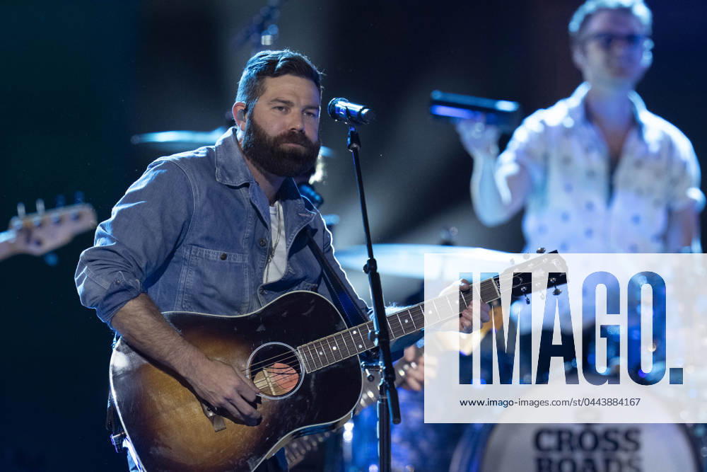 American country pop singer JORDAN DAVIS performs at a taping of CMT Country Crossroads with band NEEDTOBREATHE in front of the University of Texas Tower on April 5, 2024. Austin United States - ZUMAd150 20240405_znp_d150_010