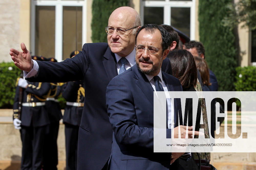 Lebanese Prime Minister NAJIB MIKATI (L) shows the way to Cypriot President NIKOS CHRISTODOULIDES upon his arrival at Beirut governmental Palace. Christodoulides arrived in Beirut for talks with officials for possible solutions for the incessant flow of displaced Syrians to the island from the Lebanese coast. Beirut Lebanon - ZUMAn313 20240408_zip_n313_003