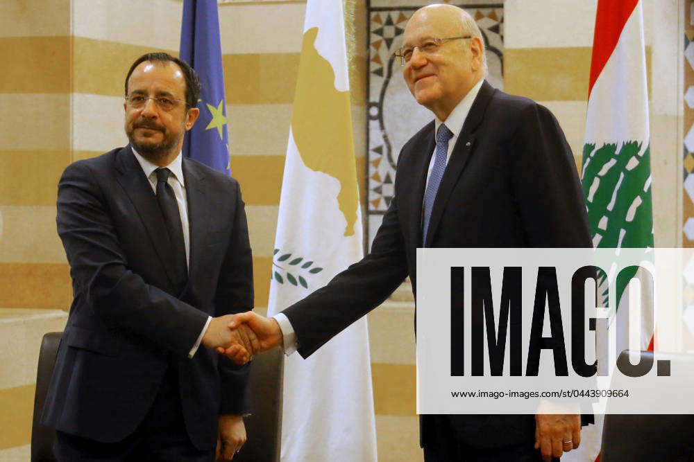 Lebanese Prime Minister NAJIB MIKATI (R) shakes hands with Cypriot President NIKOS CHRISTODOULIDES prior their meeting at Beirut governmental Palace. Christodoulides arrived in Beirut for talks with officials for possible solutions for the incessant flow of displaced Syrians to the island from the Lebanese coast. Beirut Lebanon - ZUMAn313 20240408_zip_n313_005