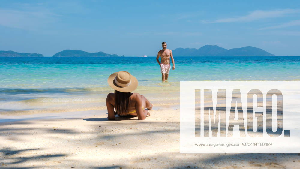 Koh Wai Island Thailand tropical Island near Koh Chang, couple of men and woman on the beach Koh Wai Island Trat Thailand is a tinny tropical Island near Koh Chang. a young couple of men and women on a tropical beach during a luxury vacation in Thailand ,model released, Symbolfoto