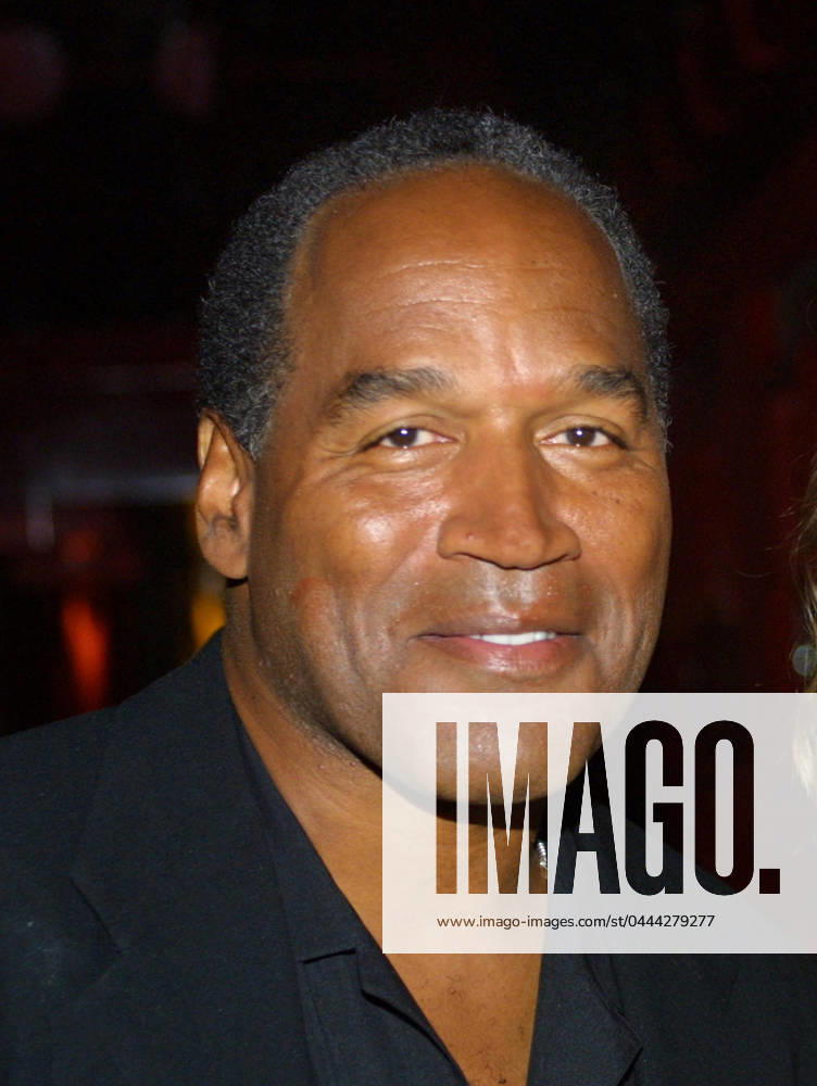 **FILE PHOTO** O.J. Simpson Has Passed Away. EXCLUSIVE Miami Beach, FL 2-7-02 OJ Simpson enjoys a night out at KISS Restaurant in South Beach. Photo by Adam Scull PHOTOlink MediaPunch