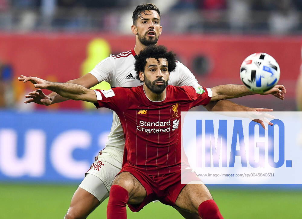 KW51 (191222) -- DOHA, Dec. 22, 2019 (Xinhua) -- Mohamed Salah (front) of Liverpool vies for the ball with Pablo Mari of Flamengo during the final of the FIFA Club World Cup Qatar 2019 in Doha, capital of Qatar, Dec. 21, 2019. (Photo by Nikku Xinhua) (SP)QATAR-DOHA-FOOTBALL-FIFA CLUB WORLD CUP-FINAL