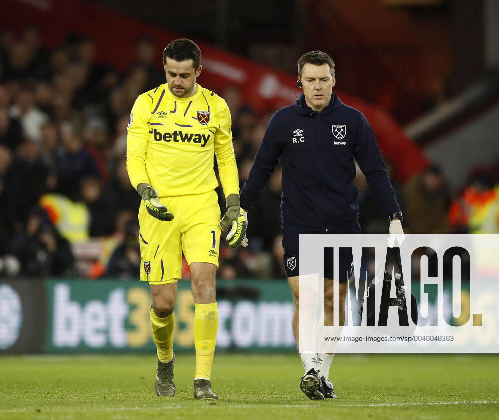 Lukasz Fabianski of West Ham United leaves the field injured during the Premier League match at Bramall Lane, Sheffield. Picture date: 10th January 2020. Picture credit should read: Simon Bellis Sportimage . SPI-0426-0057