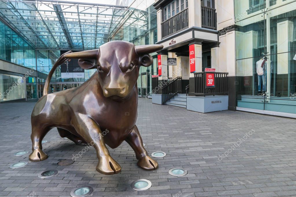 Birminghamm, UK - October 3rd, 2017 : A Bull Sculpture Outside the Front of the Bullring Shopping Centre, a landmark in Birmingham.