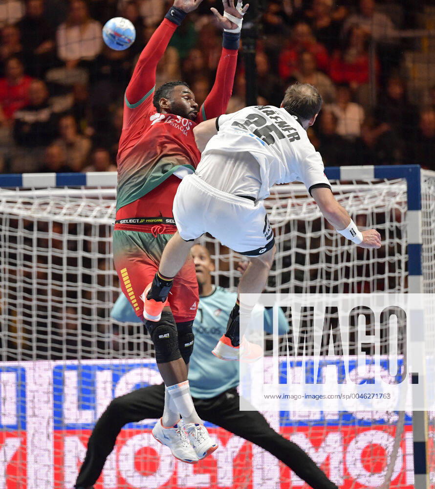 Germany s Kai Häfner in action against Portugal s Alexis Borges during the match for fifth sixth place between Germany and Portugal during the Men s European Handball Championship in Stockholm, Sweden, on Jan. 25, 2020. Stockholm Sverige