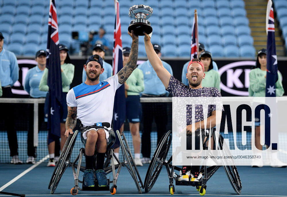 KW05 AUSTRALIAN OPEN DAY 11, Dylan Alcott (right) and Heath Davidson of Australia lift the trophy after winning their Quad Wheelchair Doubles final against Andy Lapthorne of Great Britain and David Wagner of the USA on day11 of the Australian Open tennis tournament at Margaret Court Arena in Melbourne, Thursday, January 30, 2020. ( NO ARCHIVING, , NO USE IN BOOKS WITHOUT CONSENT MELBOURNE VIC AUSTRALIA