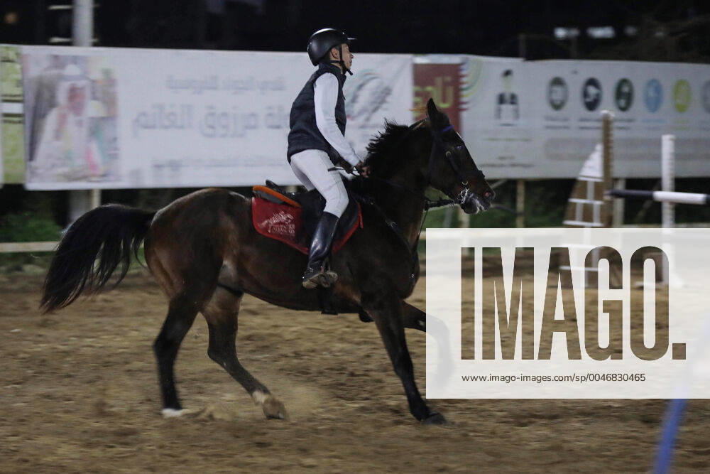 Gaza City, Gaza Strip, Palestinian Territory: Palestinian competitors ride their horses during the first championship in jump barriers for the year 2020, on February 27, 2020 Middle East News - February 27, 2020 - ZUMAap3_ 97337377st