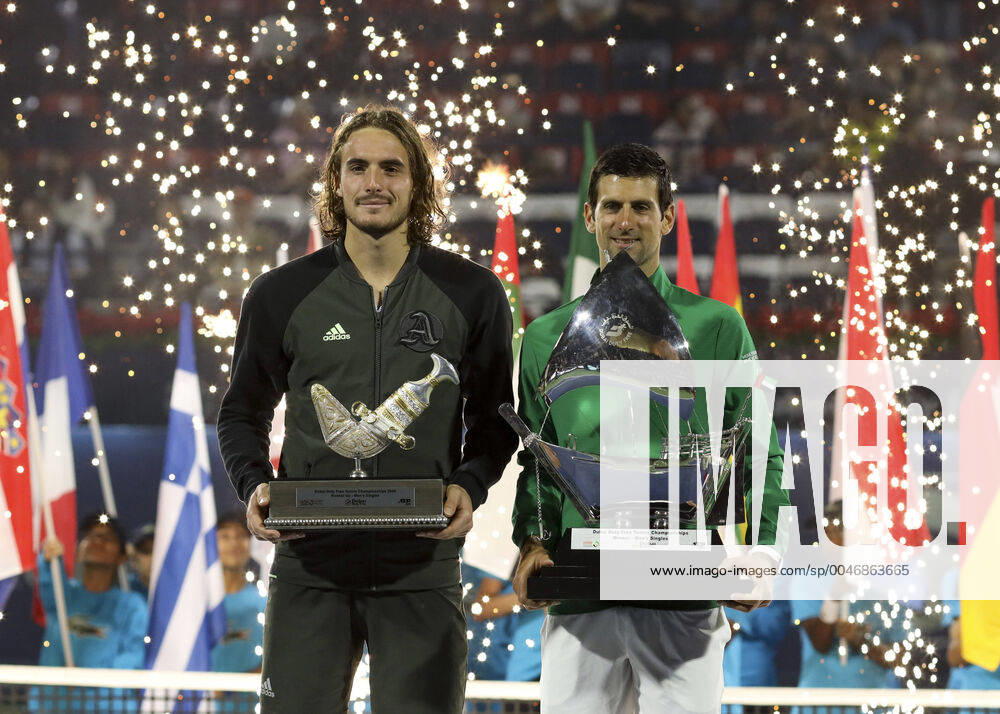 KW09 Sieger Novak Djokovic (SRB) und Finalist Stefanos Tsitsipas mit dem Pokal, Trophäe, Siegerehrung, Praesentation Tennis - Dubai Duty Free Tennis Championships - ATP, Tennis Herren - Dubai Duty Free Tennis Stadium - Dubai - - United Arab Emirates - 29 February 2020. Â